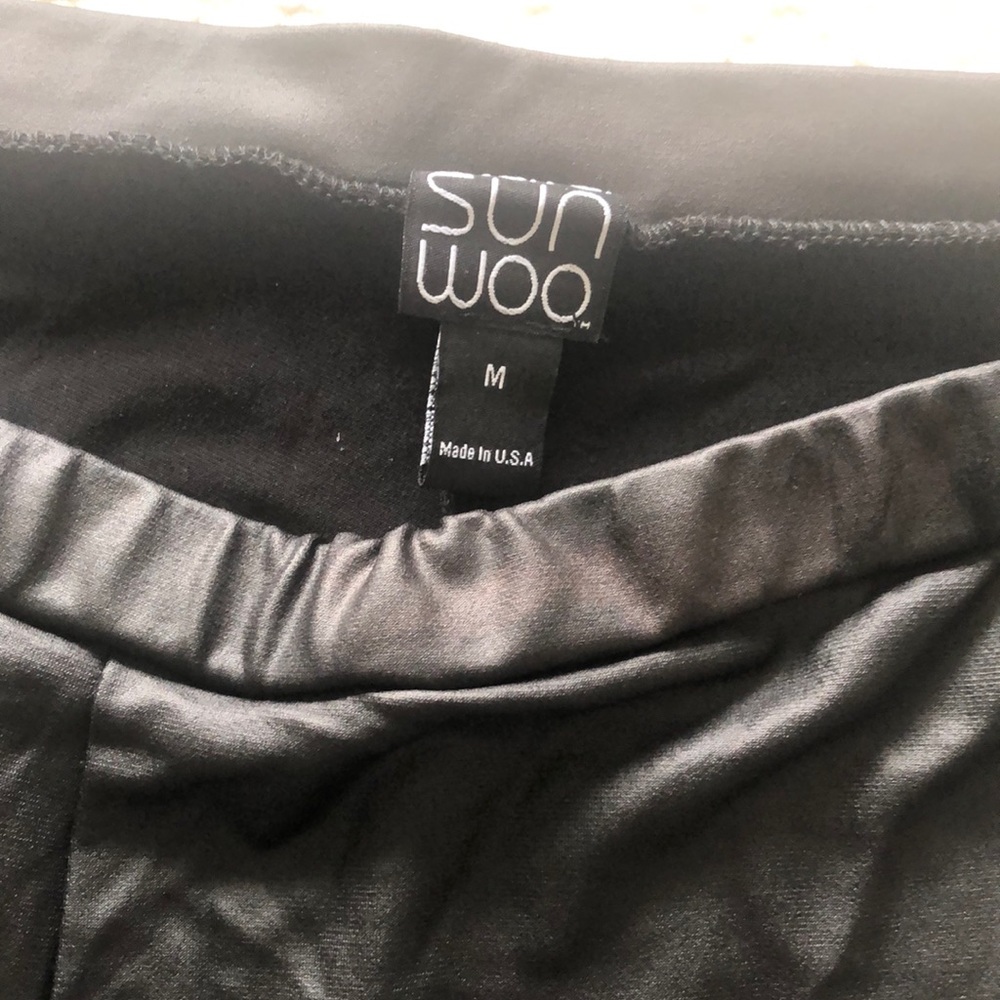 Black faux leather stretch leggings.